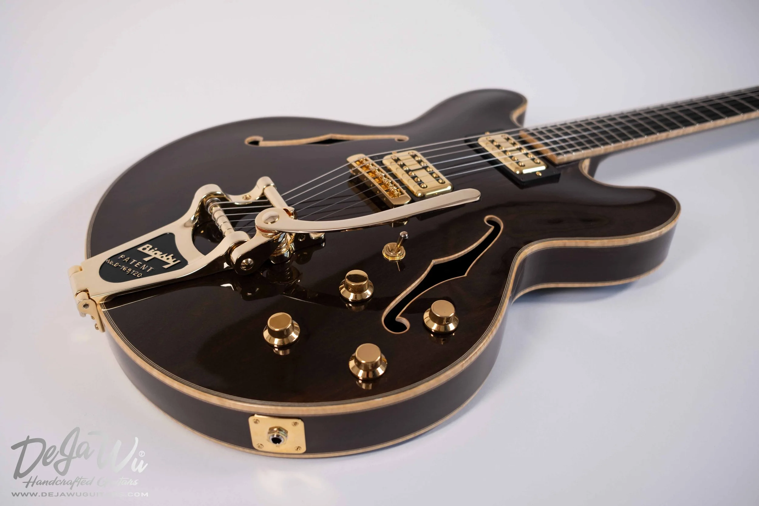 Dejawu guitars presents semi-acoustic guitar hand-carved from